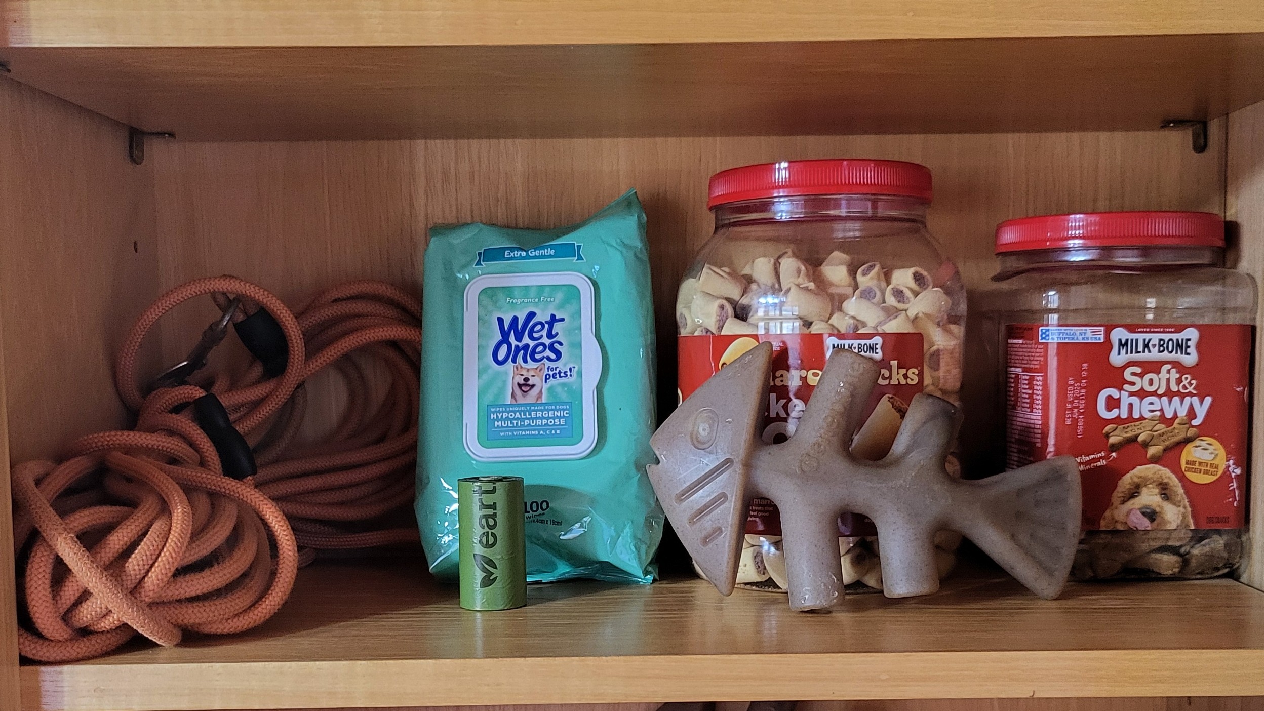 Dog amenity shelf stocked for guests at Headwaters cabin in Suches GA