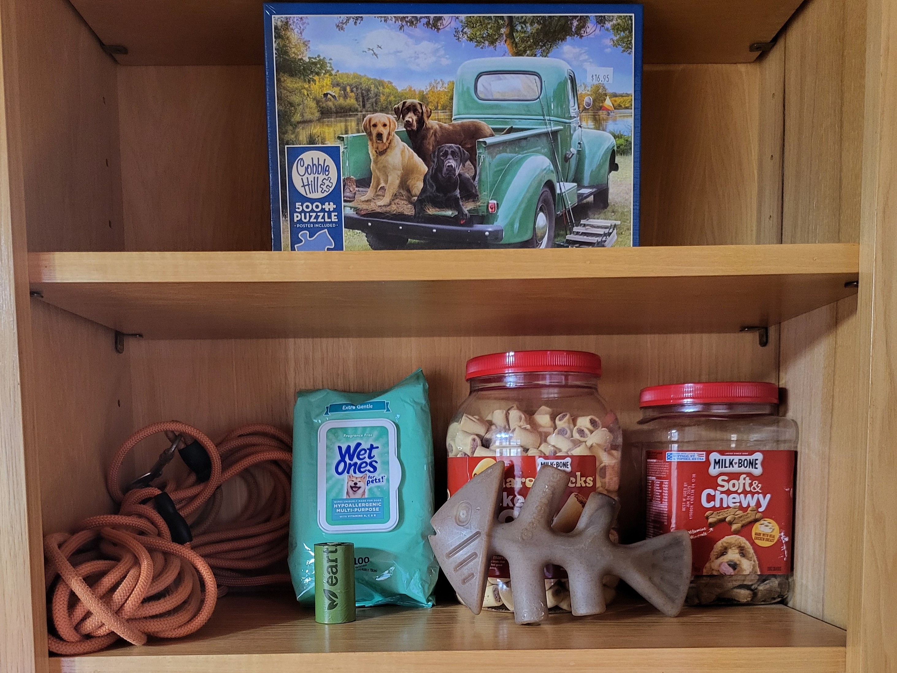 Dog amenity shelf stocked for guests at Headwaters cabin in Suches GA